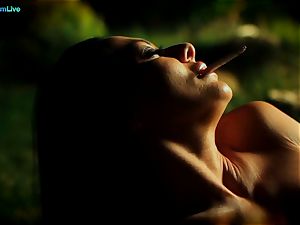 sizzling Sandra Romain smokes a cigarette and wanks